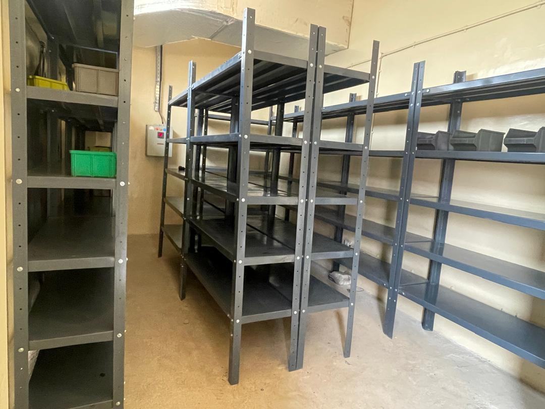 Storeroom fitted with steel shelving