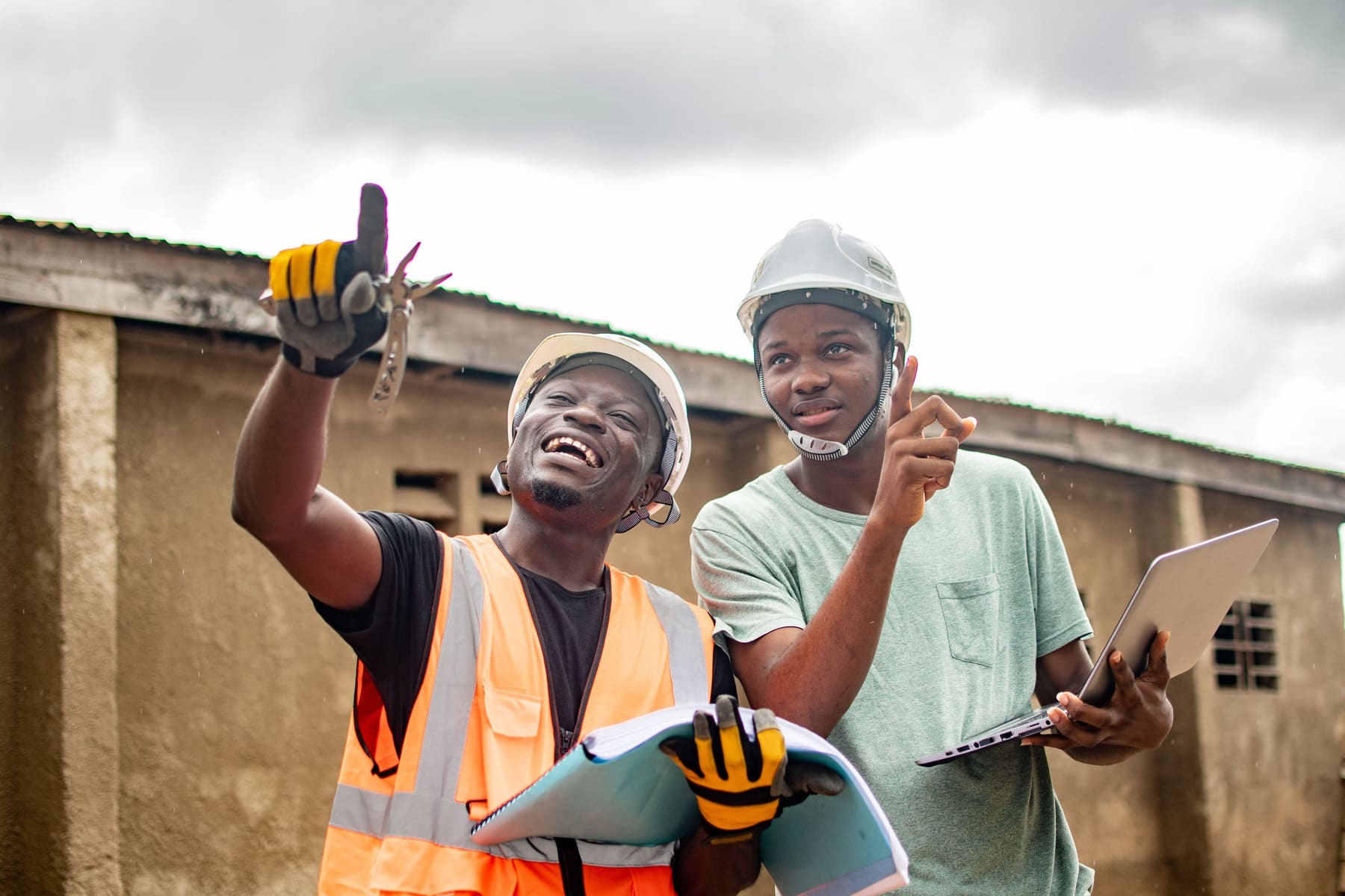 Engineers reviewing plans on site