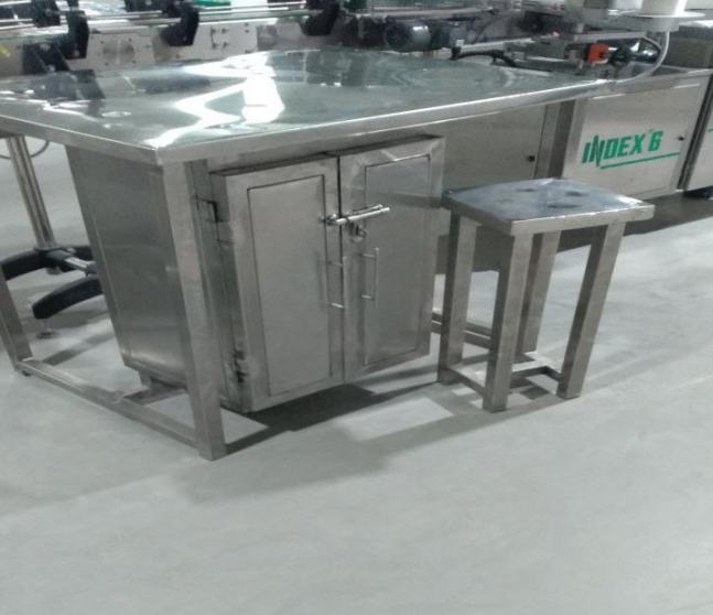 Stainless workstation and stool on a production line