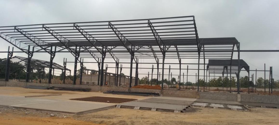 Steel stanchion and roof truss framework